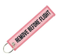 Remove before Flight pink Keyring